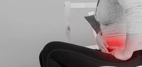 ألم الإباضة: دليل شامل للأعراض، الأسباب، التشخيص، والعلاج