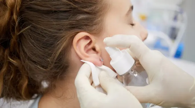 ثقب الأذن للأطفال: دليل شامل للعناية والعلاج الفعال